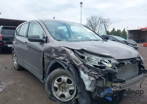 2015 Honda Cr-V Lx z USA, uszkodzony, nr VIN 5J6RM4H3XFL094438